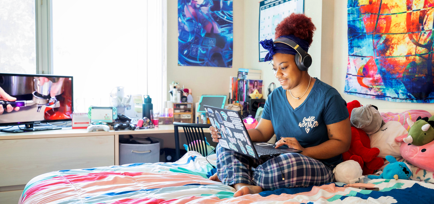 TRU student studying in housing.